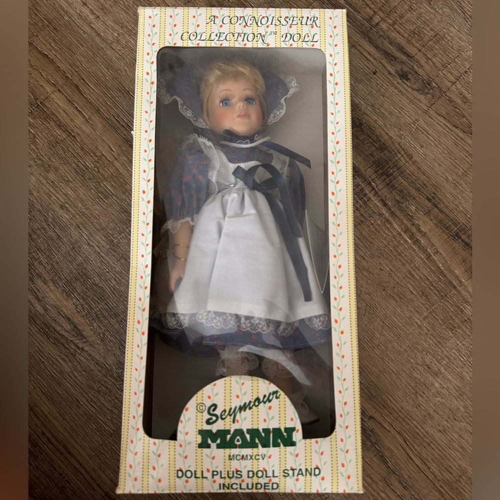 Connoisseur collection porcelain doll Seymour Mann doll plus stand